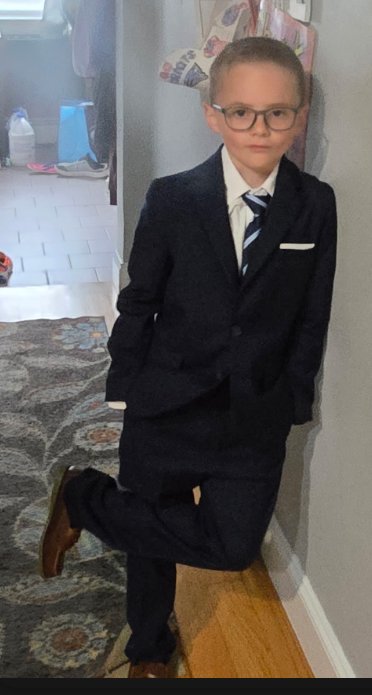 Christopher Shankle, CEO of CJS Trading, in a navy suit and tie